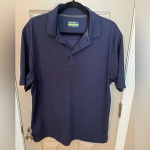 Ben Hogan Performance navy blue 30% recycled polyester short sleeve golf polo. L